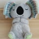thumbnail image 4 of Oso que respira, nutria pequeña, muñeco de peluche, juguete para bebé, lindo compañero calmante, muñeca musical para dormir, 4 of 5