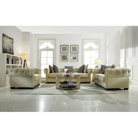 On Tufted Sofa With 4 Pillows Cream