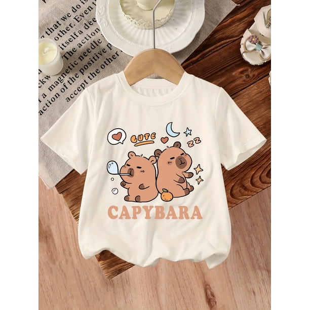 Adorable Girls' Peach Capybara Dolphin Print T-Shirt - Soft Cotton, Crew Neck, Short Sleeve, Summer Top with Cute Cartoon Graphics