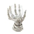 thumbnail image 1 of Eastwind Gifts 10017189 Skeleton Hand Candle Holder, 1 of 2