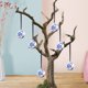 thumbnail image 1 of Adorno navideño de cerámica para árbol | Colgante de bola azul y blanca para decoración navideña | Bola decorativa pintada a mano, 1 of 6