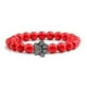 thumbnail image 1 of Pulsera con dije de huella de pata de piedra volcánica de lava negra mate natural, ideal como recuerdo para mascotas, amantes de los gatos y los perros., 1 of 2