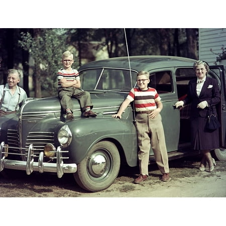 A Family Poses on and around their Plymouth Automobile, Ca. 1953 Print Wall