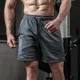 thumbnail image 4 of Pantalones cortos para hombre, pantalones deportivos anchos con gráficos para hombre, pantalones cortos de malla holgados, deportivos, ropa de 3 cuartos a granel, elegantes Y2k XL delgados, 4 of 5