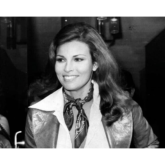 Raquel Welch 1970's smiles for cameras in leather jacket 8x10 inch photo