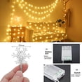 thumbnail image 4 of Luces navideñas CESOF de 20 pies y 40 LED en forma de copo de nieve, color blanco cálido, 4 of 6