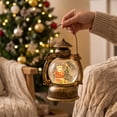 thumbnail image 4 of Christmas Musical Snow Globe Lantern, Water Filled Night Light, Oil Lamp Style Body with Swirling Glitter Warm Light and Eight Melodies, Tabletop Decor for Mantel Shelf or Bedside, 4 of 6