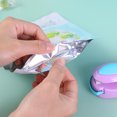 thumbnail image 1 of Mini máquina de sellado de bolsas sellador al vacío de alimentos prensado a mano (púrpura) Ndcxsfigh Libre de BPA, 1 of 9