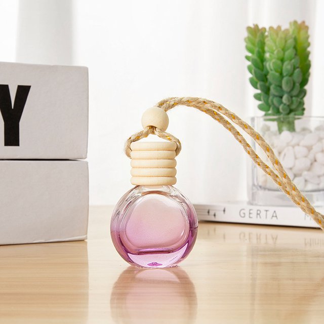 Botella vacía de perfume de cinco líneas de color redondo plano 10ML aceite esencial de aromaterapia colgante de coche botella de aromaterapia de interior