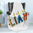 thumbnail image 4 of Liam Soft Flannel Fleece Blanket, English First Name in a Colorful Letter Style Cake Design with Bite Marks and Candles, Cozy Plush for Indoor and Outdoor Use, 60" x 80", Multicolor, by Ambesonne, 4 of 5