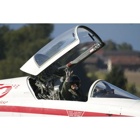 - Pilot waves from the cockpit of an F-5E Tiger II plane of the Patrouille Suisse aerobatic team Poster Print