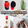 thumbnail image 1 of 10 ganchos para sombreros montados en la pared para sombreros y pelucas, casco de béisbol, adhesivo sin pinchazos, gancho doble, organizador para sombreros para el hogar, entrada (negro) ZefeiWu 8390605597282, 1 of 1