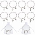 thumbnail image 1 of Pulsera de rosario elástica de 24 cuentas con bolsitas de malla, ideal para bautizo o comunión. Pulseras de conchas marinas en color concha, con crucifijo., 1 of 9