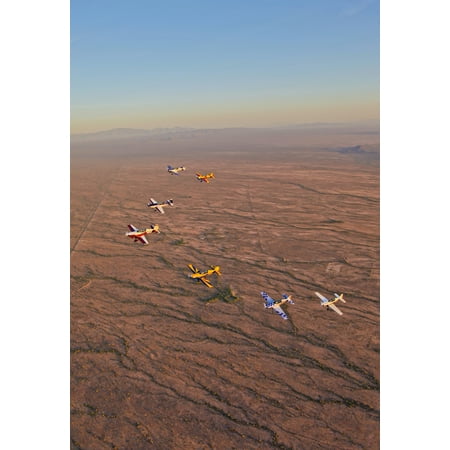 Extra 300 aerobatic aircraft fly in formation over Mesa Arizona Stretched Canvas - Scott GermainStocktrek Images (12 x