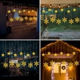 thumbnail image 4 of Twinkle Star 138 LED 12 Star Snowflake Curtain String Lights, Remote Control Window Curtain Lights with 8 Flashing Modes for Christmas, New Year, Wedding, Party, Home Decor (Warm White), 4 of 5