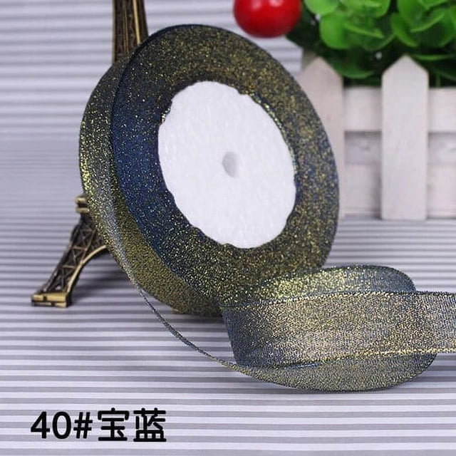 rollo de cintas de cebolla con purpurina de 20mm y 25 yardas para manualidades, rollo oscuro azul (20 mm) con brillo dorado y borde sellado, cinta desenrollada muestra textura de poliéster/nylon; adecuada para lazos, embalaje de regalo y decoraciones de fiesta.