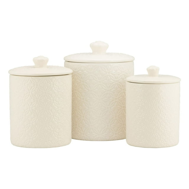 10 Strawberry Street Hampton Embossed 3 Piece Ceramic Canister Set in white, featuring three embossed ceramic canisters with ceramic lids and silicone gasket seals, designed for storing kitchen staples like flour, sugar, coffee, or tea, and also suitable for organizing dry goods or baking ingredients on countertops.
