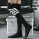 thumbnail image 3 of Calcetines de tubo alto Zhuji con cuatro rayas por encima de la rodilla Calcetines de tubo largos Calcetines de media pantorrilla INS de moda con etiquetas de tela, 3 of 5