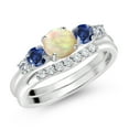 thumbnail image 2 of Gem Stone King 10K White Gold White Ethiopian Opal Blue Created Sapphire and White Lab Grown Diamond 5 Stone Bridal Engagement Wedding Ring Set for Women (0.69 Cttw, Round Cabochon, Size 7), 2 of 6