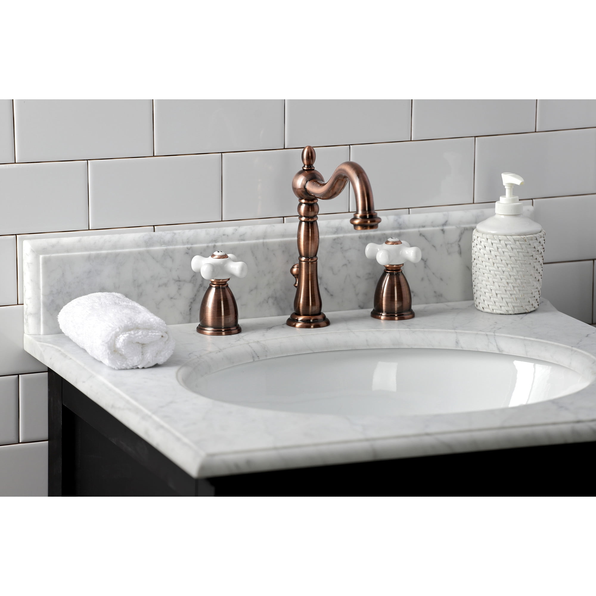 Kingston Brass KB197PXAC Heritage Widespread Bathroom Faucet with Brass Pop-Up, Antique Copper