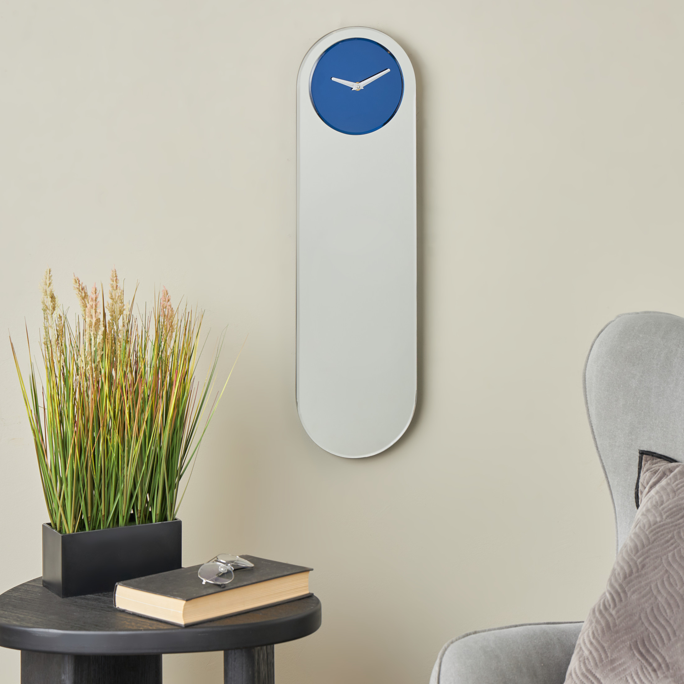 DecMode 8" x 28" Blue Glass Wall Clock with Silver Clock Hands