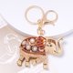 thumbnail image 2 of Llavero de lujo con diseño de elefante y sol de cristal dorado, 2 of 3