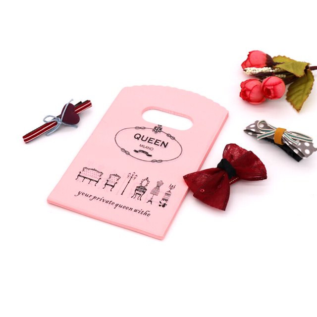 50 unids/lote, bolsa de plástico pequeña de varios diseños, 9x15cm, bolsa de regalo de Boutique con asa, bonitos abalorios, pendientes, bolsas de embalaje de joyería Tan Jianjun unisex