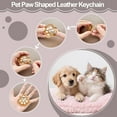 thumbnail image 3 of 6-piece pet hair storage keychain in the shape of a dog or cat paw, serves as a keepsake and memorial gift, can be attached to bags or purses., 3 of 8