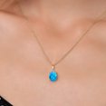 thumbnail image 3 of Gem Stone King 14K Yellow Gold Simulated Blue Opal Pendant Necklace | 0.56 Cttw | Gemstone October Birthstone | Oval Cabochon 9X7MM | Gold Necklace for Women | With 18 inch Gold Chain, 3 of 6
