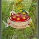 thumbnail image 1 of Comedero para colibríes de ventana con marco de metal | Comedero redondo para pájaros de ventana con ventosas y soporte adhesivo | Diseño de plástico resistente e impermeable | Estación de obse, 1 of 5