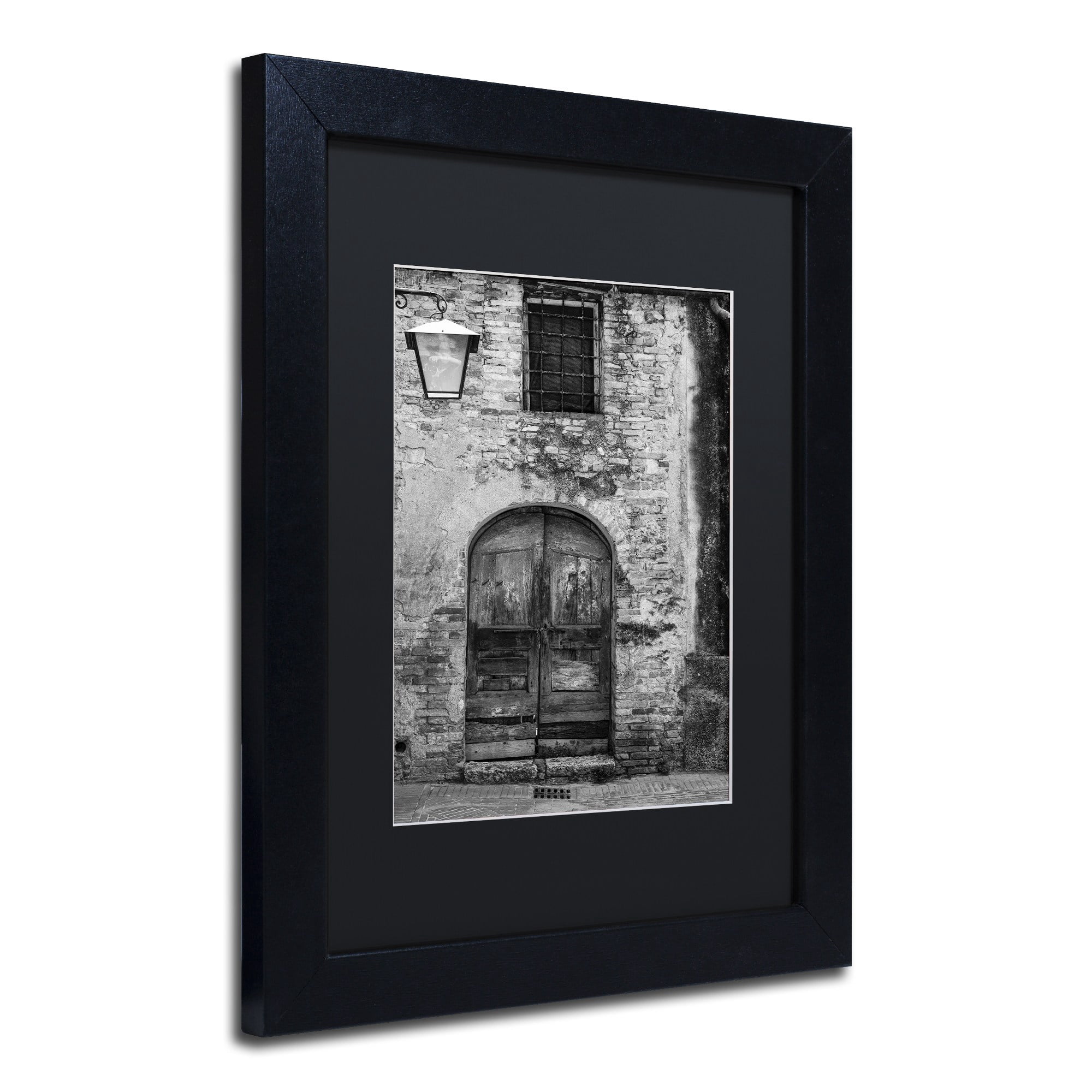 Trademark Fine Art "San Gimignano Door" Canvas Art by Moises Levy Black Matte, Black Frame