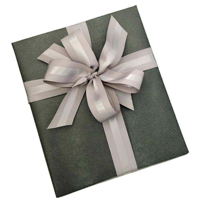 Different Colorful Wrapping Paper Rolls Gift Bows Ribbons Grey Table Stock  Photo by ©NewAfrica 582793400