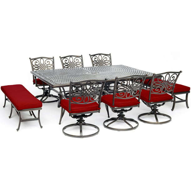 Hanover Traditions 9-Piece Dining Patio Set with 6 Swivel Rockers, 2 Benches, and a 60″ x 84″ Cast-Top Dining Table