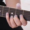 thumbnail image 4 of Púas Kit de accesorios de guitarra incluye 15pcs Protectores de dedos de guitarra de silicona + 10pcs Selecciones de guitarra para principiantes de guitarra acústica TOMSHOO Púas, 4 of 5