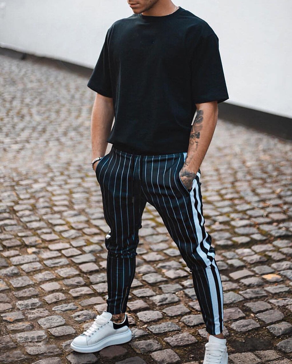 Sidestriped sports trousers  BlackMulticoloured  Men  HM IN