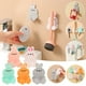 thumbnail image 4 of Gancho de pared para enchufes, colgador adhesivo de pared, gancho multifuncional para enchufes, gancho de pared para colgar electrodomésticos pequeños, organizador decorativo para el hogar,, 4 of 9