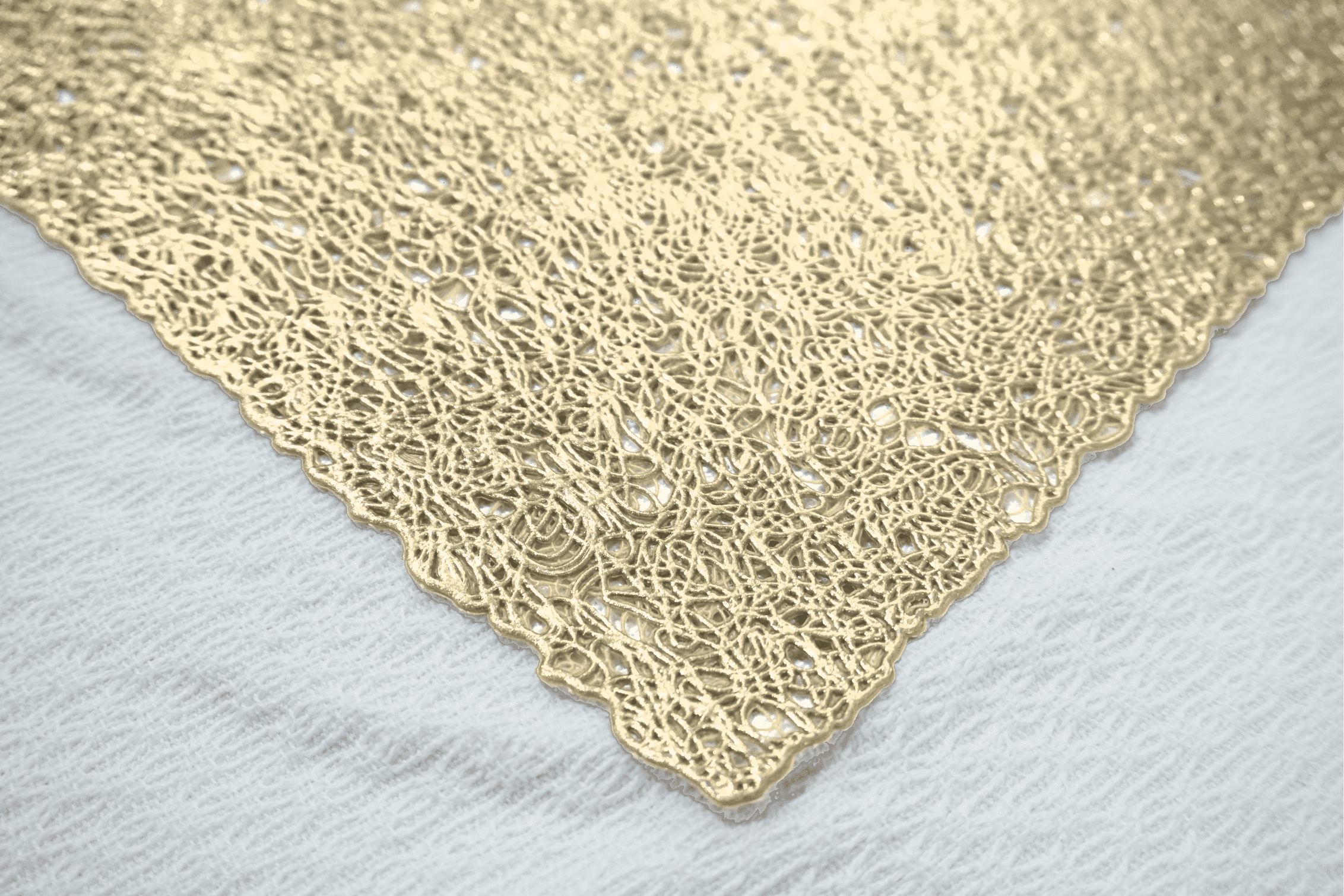 Dainty Home Royal Woven Metallic Lace Crossweave With A Sunburst Metallic Lace Pattern Reversible 12" x 18" Rectangular Placemat Set of 4 in Gold