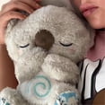 thumbnail image 4 of Oso koala relajante, nutria durmiendo, koala para aliviar la ansiedad, nutria que respira, juguete de peluche portátil con música, luz y movimiento de respiración rítmico., 4 of 4