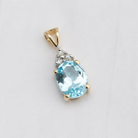 Silver & Stone Jewels Oval Cut Blue Topaz 14K Yellow Gold Finish Silver Women's Pendant Necklace