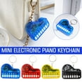 thumbnail image 4 of DLQT Transparent Yellow Creative Mini Electronic Piano Keychain Pendant Luminous Music Toy Playing Music Pronunciation Small Piano Small Gift, 4 of 8