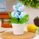 thumbnail image 1 of Mini adornos de Pascua en maceta para interiores, ideales para decorar el hogar con motivos festivos. Un regalo perfecto para estas fiestas., 1 of 7