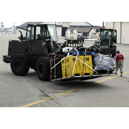LAMINATED POSTER An U.S. Air Force forklift transports pallets from a Los Angeles Search and Rescue team, Task Force Poster Print 24 x