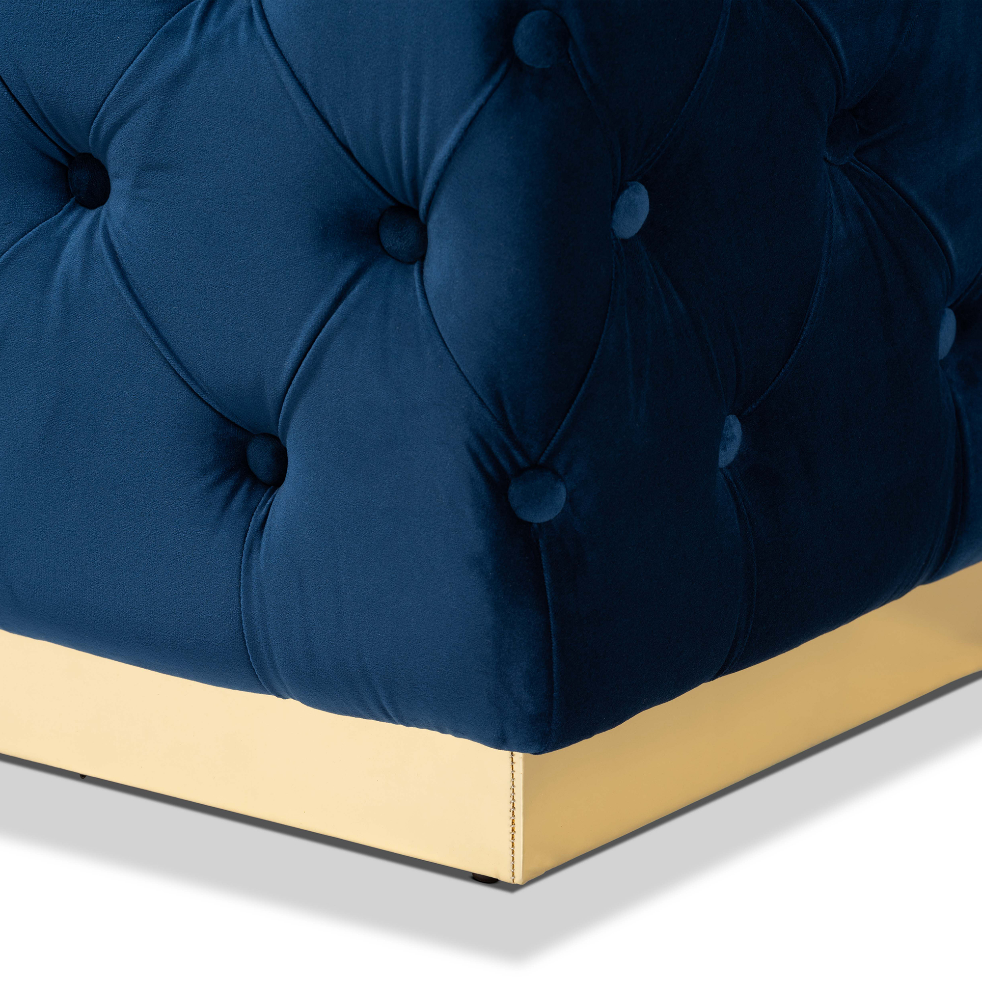 Baxton Studio Corrine Glam and Luxe Navy Blue Velvet Fabric Upholstered and Gold PU Leather Ottoman