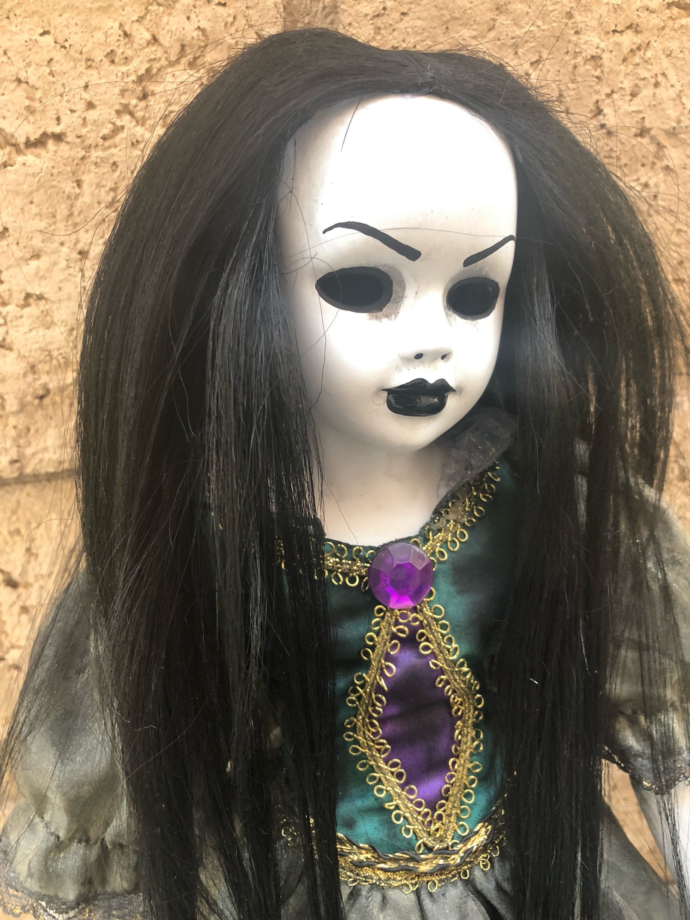 A Creepy Haunted Doll That Aged, and One with Growing Hair - Journalnews