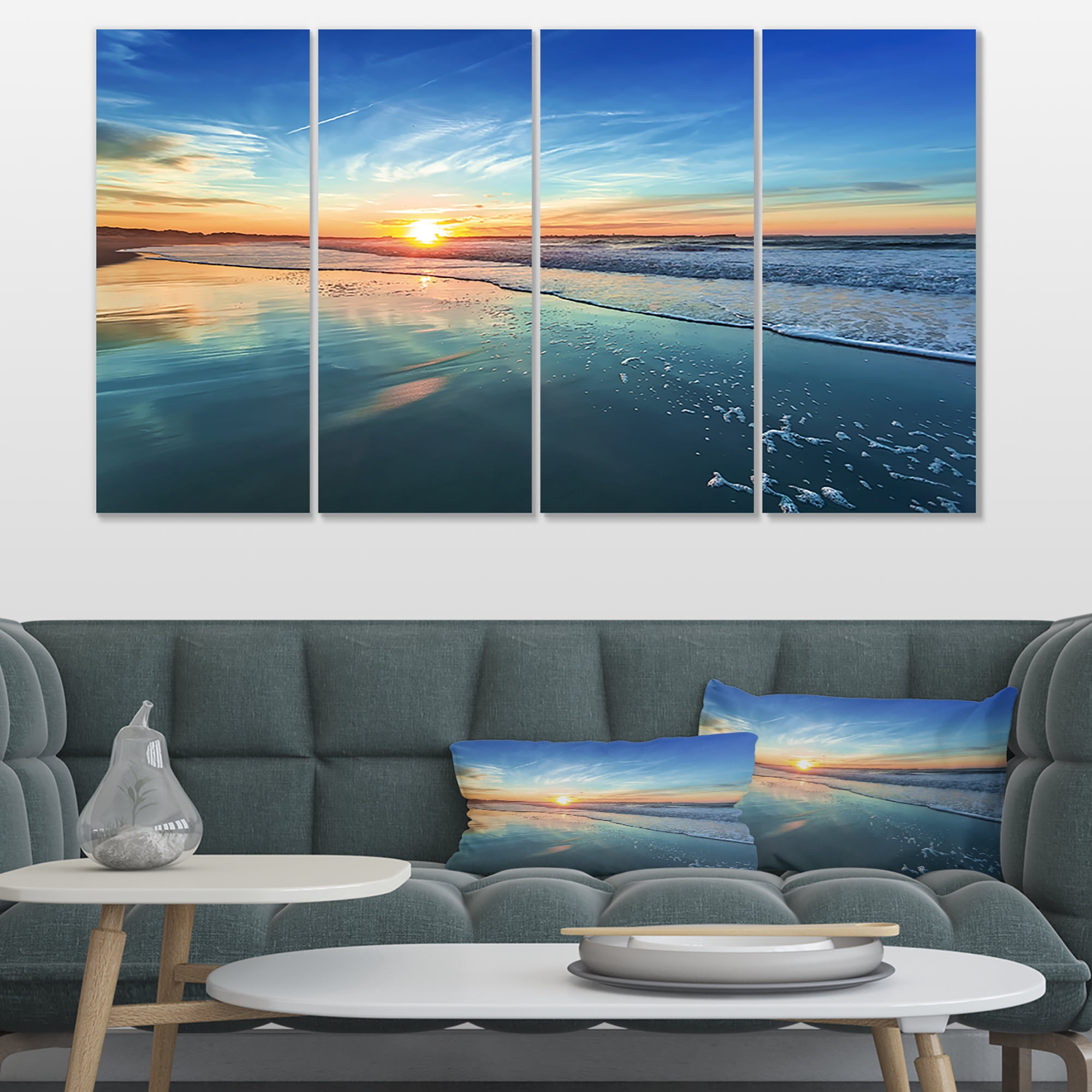 Designart 'Blue Seashore with Distant Sunset ' Seascape Canvas Art Print