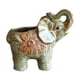 thumbnail image 1 of Maceta con forma de elefante de cerámica con diseño floral en relieve, 1 of 3