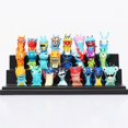 thumbnail image 3 of Figuras de jes de Slugterra - Colección de 24 Diseños Únicos, Decoración en Tamaño Pequeño (4-6 cm), Hechas de PVC (24 Piezas), 3 of 3