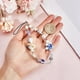 thumbnail image 3 of Dije de cuentas para teléfono, correa de muñeca estilo océano, resina acrílica, concha, estrella de mar, corazón, cordón corto para teléfono, colgantes para bolso, accesorios de joyería, 3 of 6