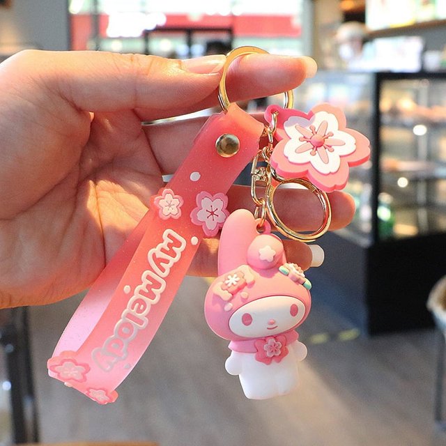 LLavero de Sanrio con melodía Kuromi para mujer, llavero Kawaii de dibujos animados de rana, pudín, perro, pingüino, colgante para bolso de mujer, venta al por mayor, 2024