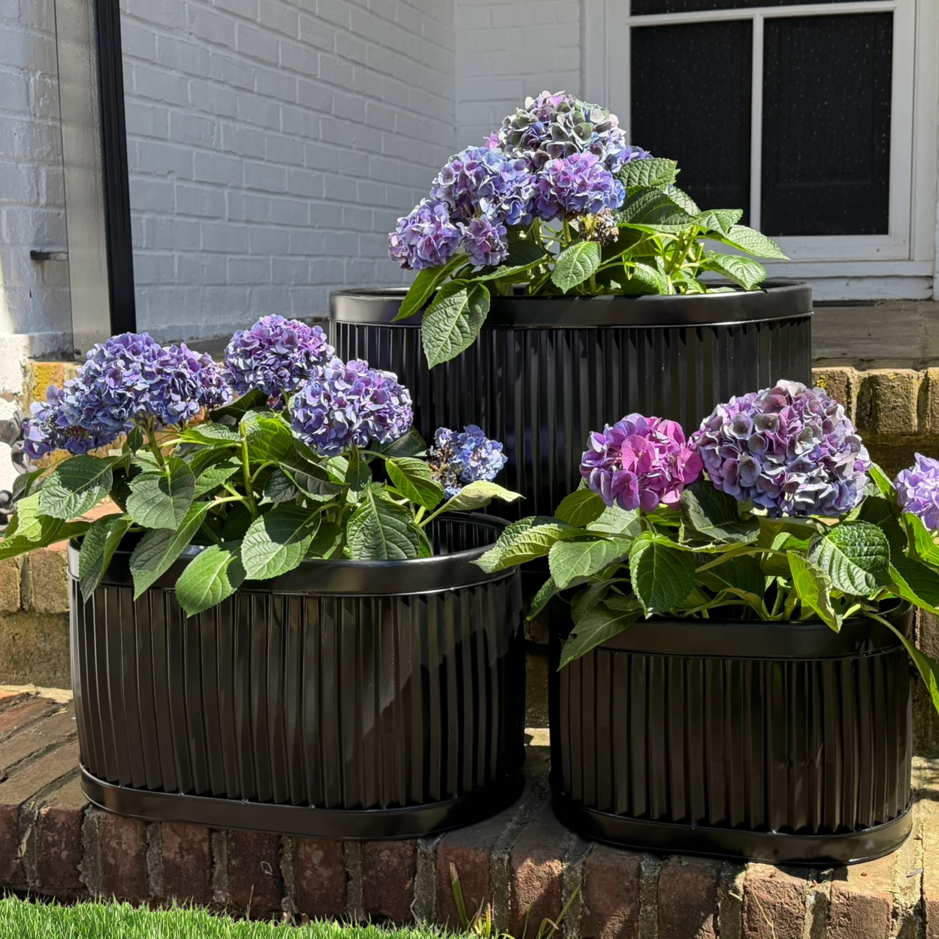 WHW Whole House Worlds French Country Style Oval Planters, Set of 3, Glossy Black, Galvanized Metal, Chubby Ripple Belly, Corrugated Cache Pots, Rustic, Over 2 ft., 24.5, 20 and 14.5 Inches